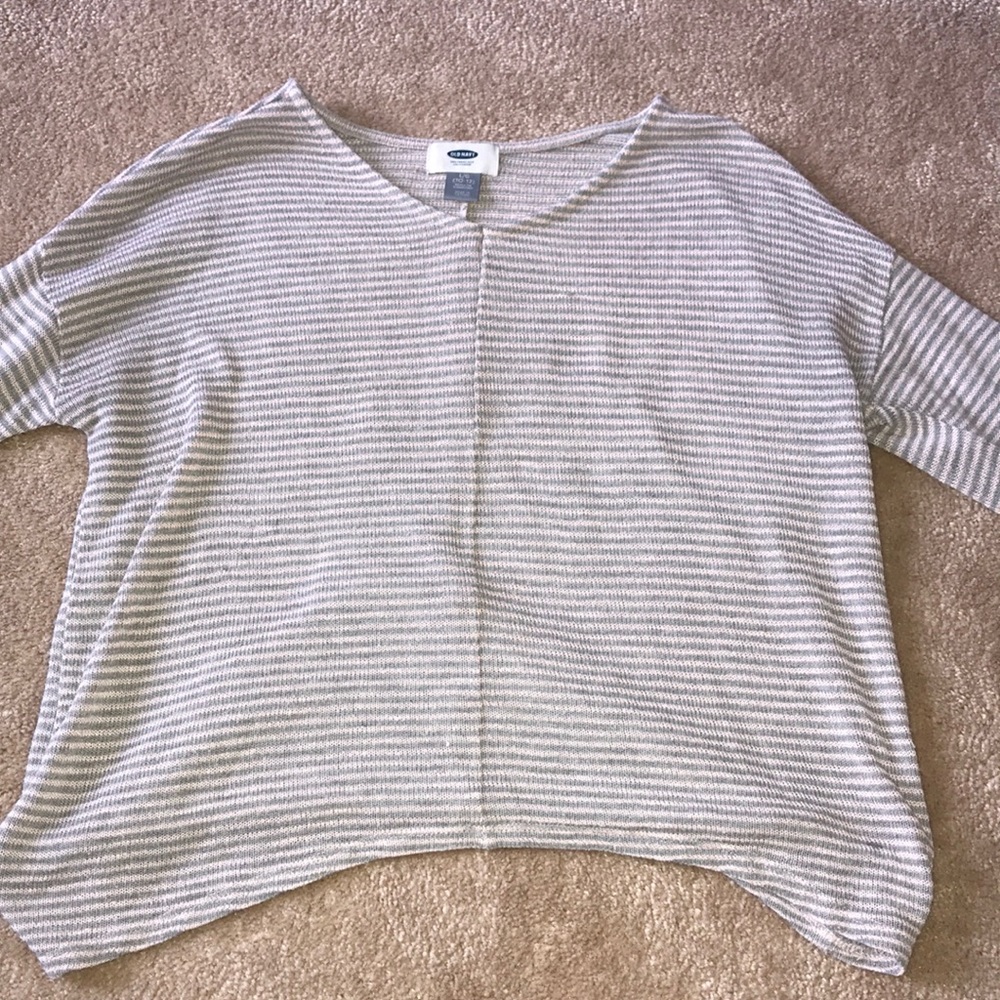 pink and grey cropped long sleeve shirt